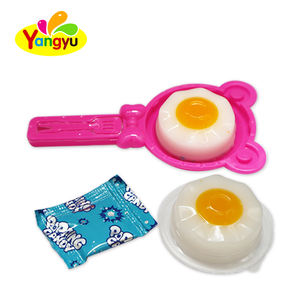 Pudín de gelatina frito con sabor a fruta en forma de huevo para niños empaquetado en una botella con dulces en una caja - Product Image 3