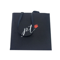 Sac en papier personnalisé de luxe noir en kraft fait main avec poignée Flexiloop et ruban, pour emballage de vêtements, cadeaux, shopping, bougies de marque, faible MOQ