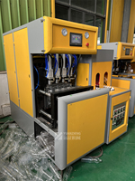 Nouvelle conception, économie d'énergie, vente en gros directe d'usine, machine semi-automatique à 2 cavités pour flacons de médicaments de 100 ml et 500 ml, machine à flacons pharmaceutiques