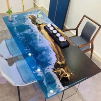 Table de restaurant au design unique en noyer massif avec plateau en résine époxy effet rivière