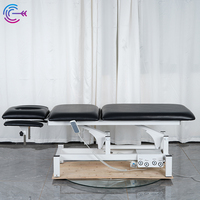 Table de massage électrique de beauté Table d'examen portable Table de massage de physiothérapie