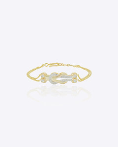 <b>Love</b> Knot Elegant Romantic Luxury Handcrafted Designer Statement Bracelet Interlinked Knot Motif Fashion Jewelry Gold T Danta - Product Image 1