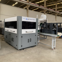 Machine de soufflage automatique haute vitesse pour bouteilles PET avec composants PLC Mitsubishi pour la production de bouteilles d'eau et de boissons