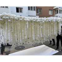 Fleur suspendue au plafond en glycine et roses enroulées de luxe JIN PENG pour la décoration de mariages, de fêtes et d'événements