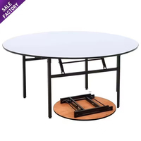 Table pliante ronde en bois ignifuge Sino Perfect pour hôtels, banquets, mariages, avec pieds pliables et plateau en contreplaqué PVC