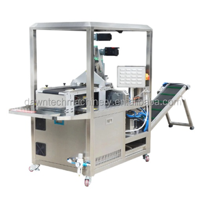 Machine de pliage et d'emballage automatique de masques faciaux Yunqingtech, machine de remplissage et de scellage de masques avec système pneumatique - Product Image 1