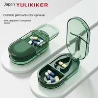 Mini coupe-pilules multifonctionnel en plastique avec boîte de rangement scellée, compact et pratique pour la maison ; pilulier portable de style japonais