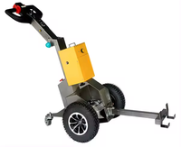 Chariot de manutention à batterie pour palettes, avec fonctions de traction et de poussée, et chariot de transport à roulettes motorisé