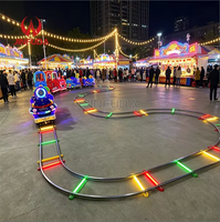 Train électrique lumineux populaire pour enfants, avec piste mobile, idéal pour les parcs, les stands et les centres commerciaux