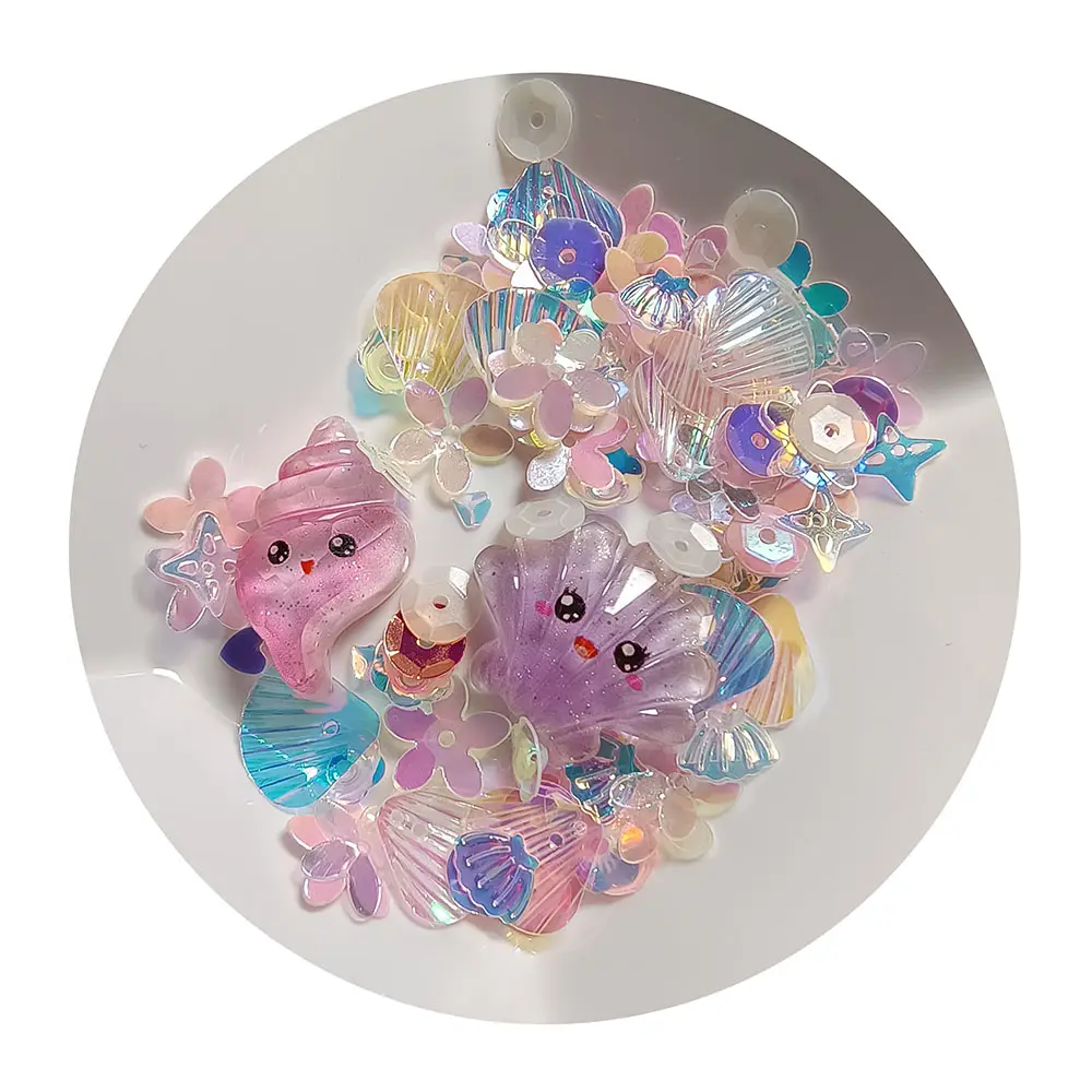 Commercio all'ingrosso fatto a mano stile cartone animato oceano pesce conchiglia di cristallo melma fai da te perline di plastica resina Kawaii Charms 1 sacchetto