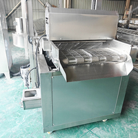 Friteuse à convoyeur automatique pour produits carnés, idéale pour la transformation de poulet frit, boulettes de viande et tempura en usine.