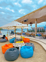 Décoration de plafond pneumatique de style grec rideau de parasol extérieur populaire pour les arrangements saisonniers de bord de mer de restaurant extérieur