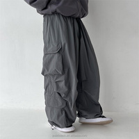 Vente en gros d'usine Pantalon cargo ample et décontracté pour hommes et femmes, ample, ample, ample, jambe large, pantalon parachute pour hommes