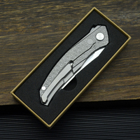 Couteau de poche de survie en plein air en acier inoxydable D2 de nouvelle conception 2026, OEM et ODM, couteau pliant EDC avec manche en alliage de titane