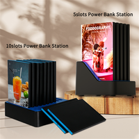 Vente chaude téléphone portable powerbank restaurant table publicité bureau à domicile 5 ports téléphone portable station de charge organisateur