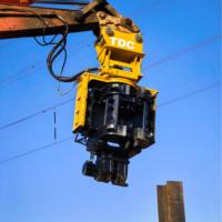 Dents de serrage latérales multifonctionnelles 12m Machine d'entraînement de pieux Marteau vibrant Pilote de pieu avec moteur importé des États-Unis