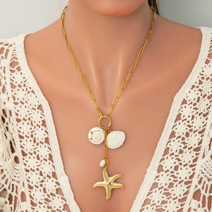 สร้อยคอสแตนเลสรูปปลาดาวชุดมหาสมุทรใหม่จี้แฟชั่นพร้อมสร้อยคล้องคอไข่มุกและคลิปหนีบกระดาษ - Product Image 1