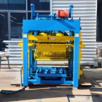 Machine mécanique QTJ4-25 pour la production de briques en béton, de blocs creux et de blocs emboîtables