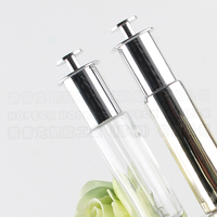 Flacon rond en verre givré HOPECK pour huile essentielle/sérum, pipette compte-gouttes argentée en forme de T avec bouton poussoir et marquage à chaud