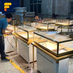 <span class=keywords><strong>Vitrine</strong></span> à bijoux ronde haut de gamme en verre, comptoir <span class=keywords><strong>d</strong></span>'exposition modulaire doré, aménagement intérieur de magasin de luxe - Product Image 5