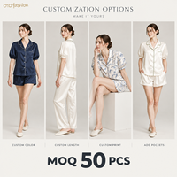 Ensemble de pyjama pour femmes en satin ivoire, manches bouffantes courtes, col cranté, bordure verte, OEM, étiquette privée, vente en gros