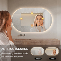 Miroir intelligent anti-buée moderne avec LED, IP44, forme ovale personnalisée, éclairage LED à intensité variable, miroirs de salle de bain pour hôtel