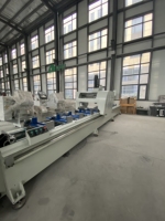 Centre d'usinage CNC pour profilés aluminium robustes OUWO avec broche motorisée italienne et Siemens 828D pour usine de murs rideaux