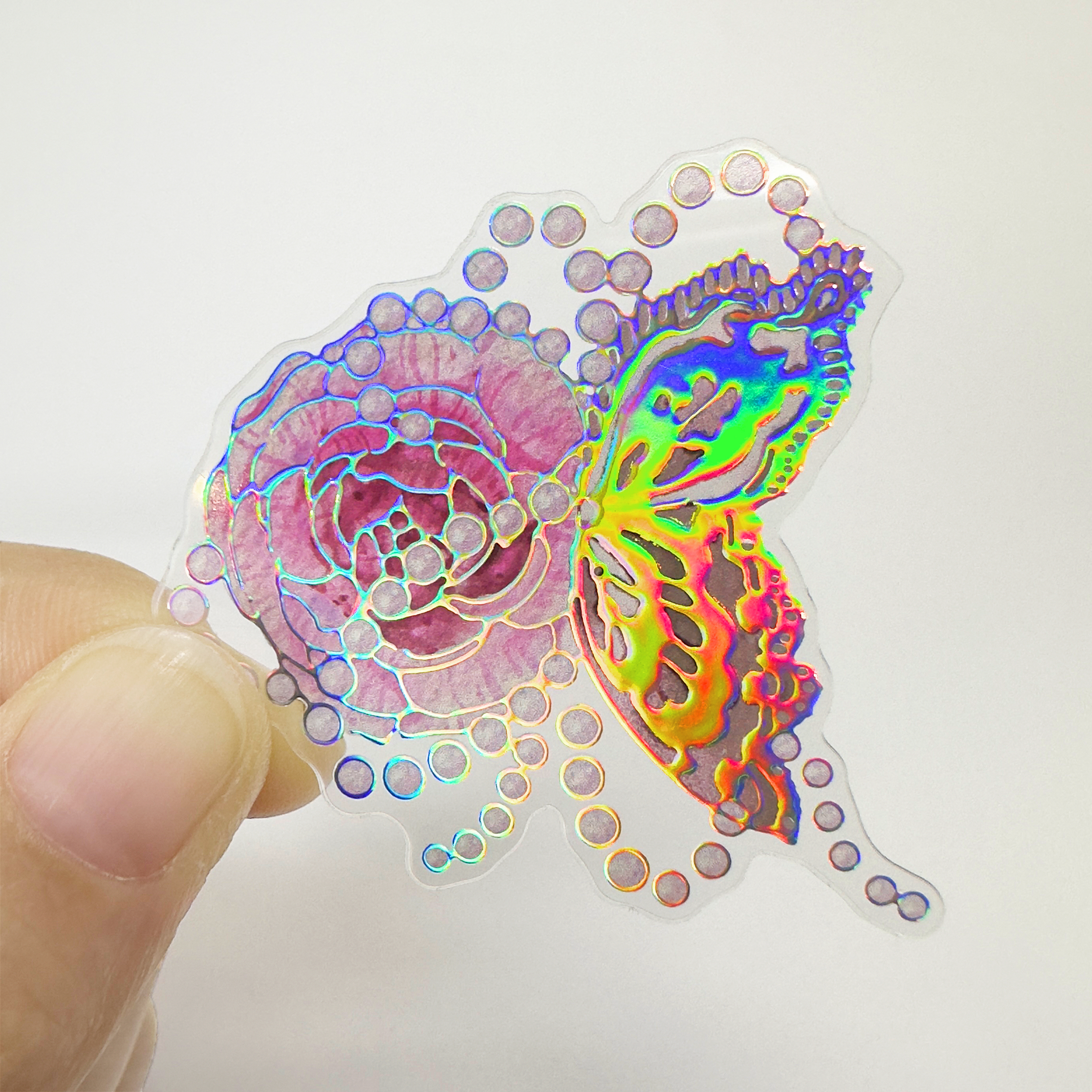 Transparent PET/BOPP sticker with holographic silver example