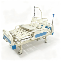 Lit médicalisé manuel réglable homologué CE ISO avec poteau de traction et support pour perfusion pour hôpital