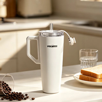 Bouteille isotherme haute performance en acier inoxydable avec poignée, design étanche et scellé de toutes parts, compatible micro-ondes