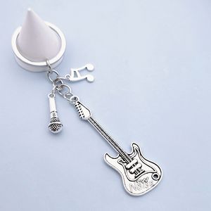 <span class=keywords><strong>Instrument</strong></span> de <span class=keywords><strong>musique</strong></span> créatif pendentif événement <span class=keywords><strong>cadeau</strong></span> sac pendentif métal laque guitare <span class=keywords><strong>porte</strong></span>-clés - Product Image 6