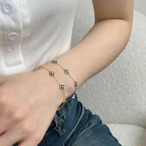 Custom New Model Lucky 18K Gold Plated 925 Sterling Silver Four-Leaf Clover Zircon Inlay Butterfly Tail Charm Bracelet For Women