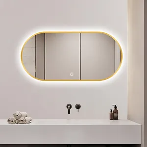 Bingkai emas logam tebal, lampu latar dengan lampu LED cerdas penghilang kabut kamar mandi meja rias Hotel lilin cermin labu