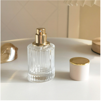Bouteilles de parfum en verre en forme de cylindre de 30ml 50ml 100ml flacons vaporisateurs de parfum vides transparents et contenants d'huiles essentielles rechargeables