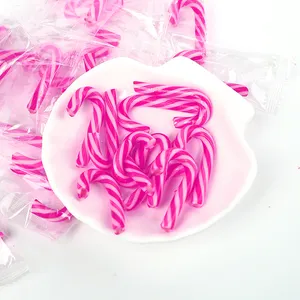 weihnachts-snoopgoed rosa süßigkeiten zuckerstäbchen weihnachtsstick süßigkeiten weihnachtsdekoration süßigkeiten-stockmacher
