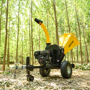 Austter auto-alimenté 15HP moteur à essence monté sur remorque déchiqueteuse de bois Mobile pour l'écaillage de palettes en bois