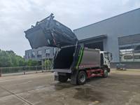 Véhicule de collecte des ordures vert Sinotruk 4x2 pour l'accès aux garages souterrains