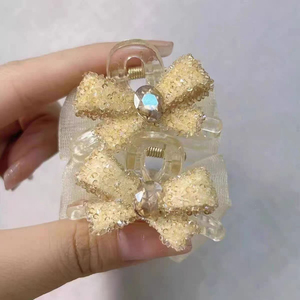 Nouveau produit, design de niche populaire, pince à cheveux élégante avec nœud papillon couleur champagne, pince à cheveux légère et luxueuse pour femmes, bijoux de mode - Product Image 1