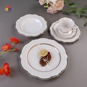 GXKC Service de table de luxe en porcelaine fine de Chine haute qualité Nouvelles assiettes en or gaufrées Tasses à thé et sauce pour la maison ou le mariage - Product Image 3