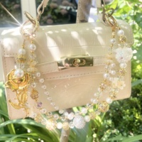 Cadena de lujo para teléfono móvil con cuentas de cristal, borla de perlas y colgante de rosa, personalizable al por mayor