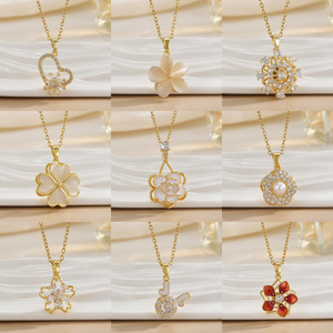 Collier tendance en acier inoxydable doré avec pendentif rotatif en forme de cœur et de papillon, collier pour femme, cadeau - Product Image 4