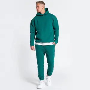 Men tracksuit, green tracksuit with custom logo and tags from Pakistan Manufactured by Huzaifa Products