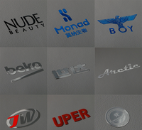 Vente en gros d'autocollants de logo de luxe étanches personnalisés 3D en relief pour étiquette d'emballage