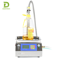Machine de remplissage automatique haute précision pour bouteilles en verre, eau, boissons, huiles comestibles, détergents et shampoings (capacité 20ML-5000ML)