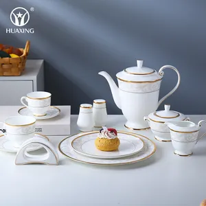 Plato de cena de porcelana blanca de hueso, juego de mesa de comedor de lujo con borde dorado, diseño real