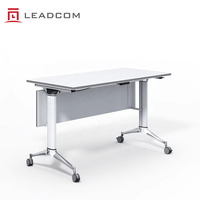Table de conférence à plateau rabattable LEADCOM LS-418 pour projets de réaménagement de bureaux et de formation en entreprise, avec structure en magnésium-aluminium