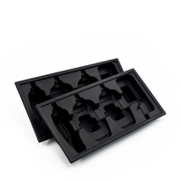 Plateau en papier moulé noir personnalisé avec logo, en matériaux recyclés biodégradables, gaufrage et estampage recyclables