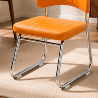 Chaise de salle à manger rembourrée moderne avec structure tubulaire cantilever et dossier nervuré pour cuisine, salle à manger, café et bistrot-bar