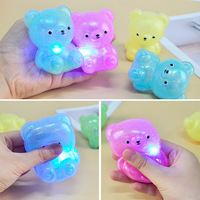 Jouet anti-stress ours mignon lumineux à poudre dorée créative pour jeunes, à presser et sonore