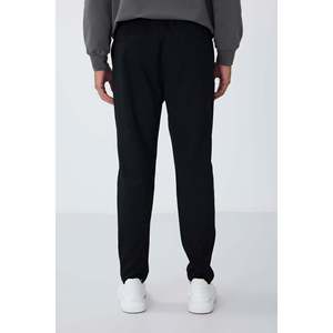 Pantalon de survêtement noir pour homme, coupe standard, taille élastique, tissu respirant décontracté - Product Image 1